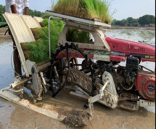 C:\Users\amitp\OneDrive\Desktop\Equipments\agriculture implement\rice transplanter.jpg